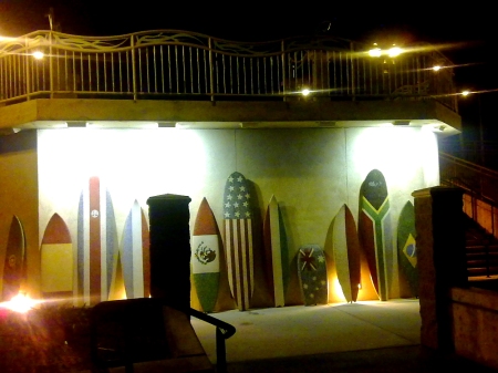 surf boards with flags
